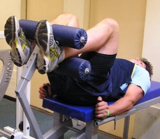 Tom Carter in the hip and knee flexed position of the HipneeFlex